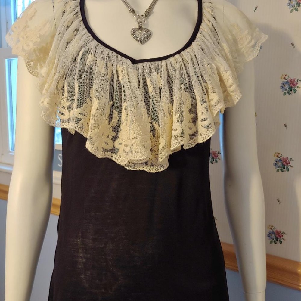 Lace trimmed black tank top.